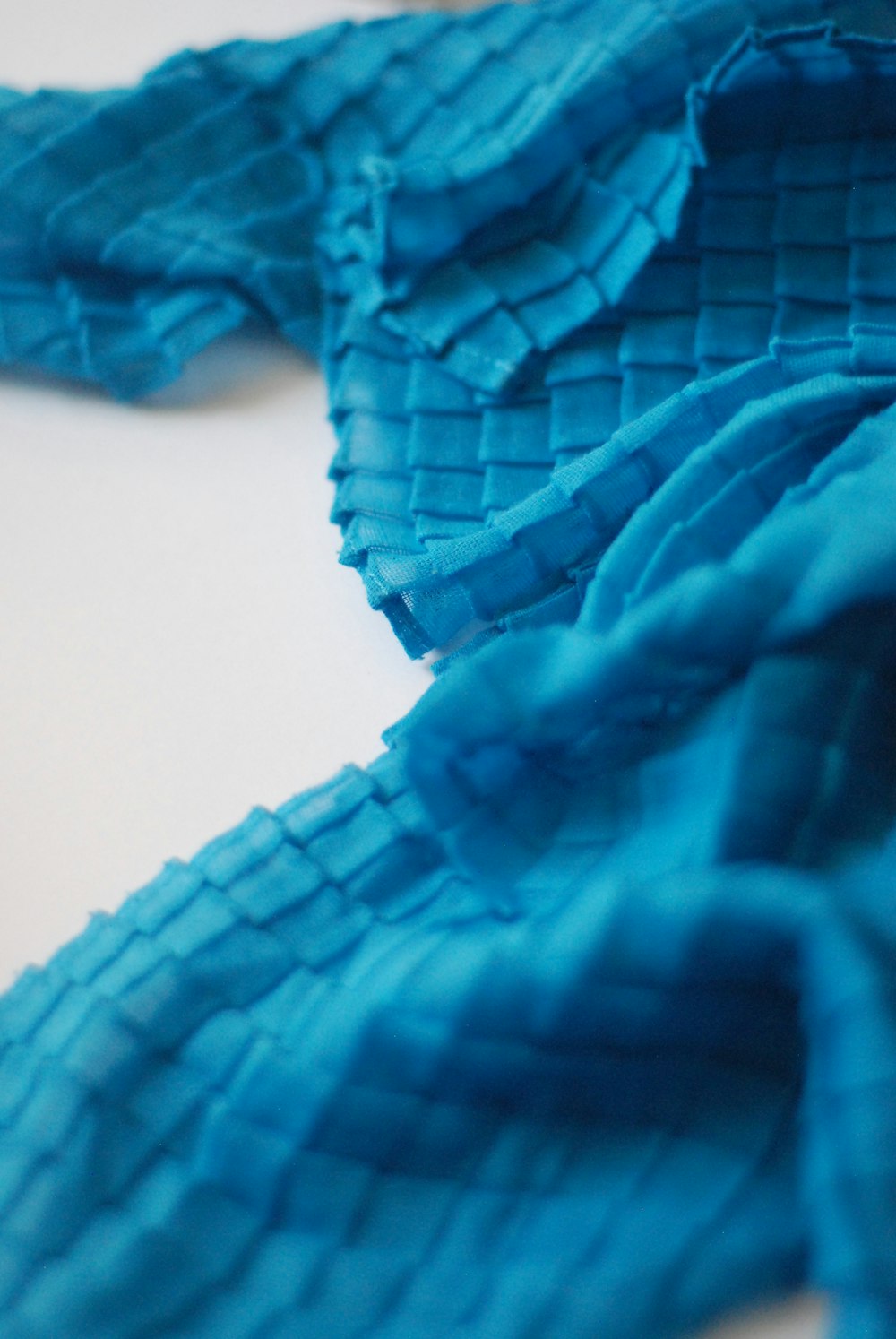 a close up of a blue piece of cloth