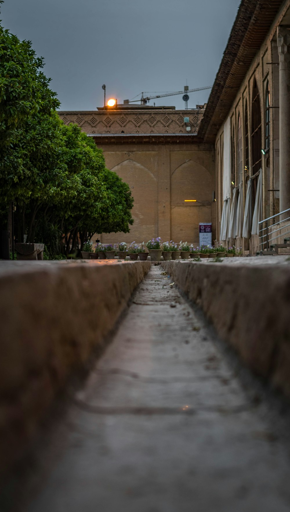 a long narrow walkway in front of a building