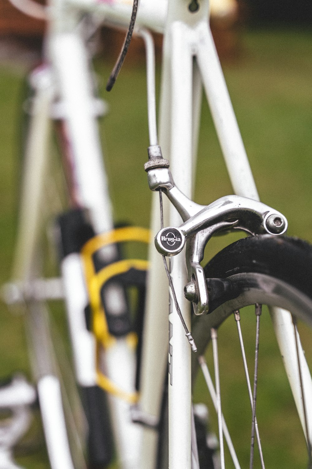 a close up of the front brake of a bicycle