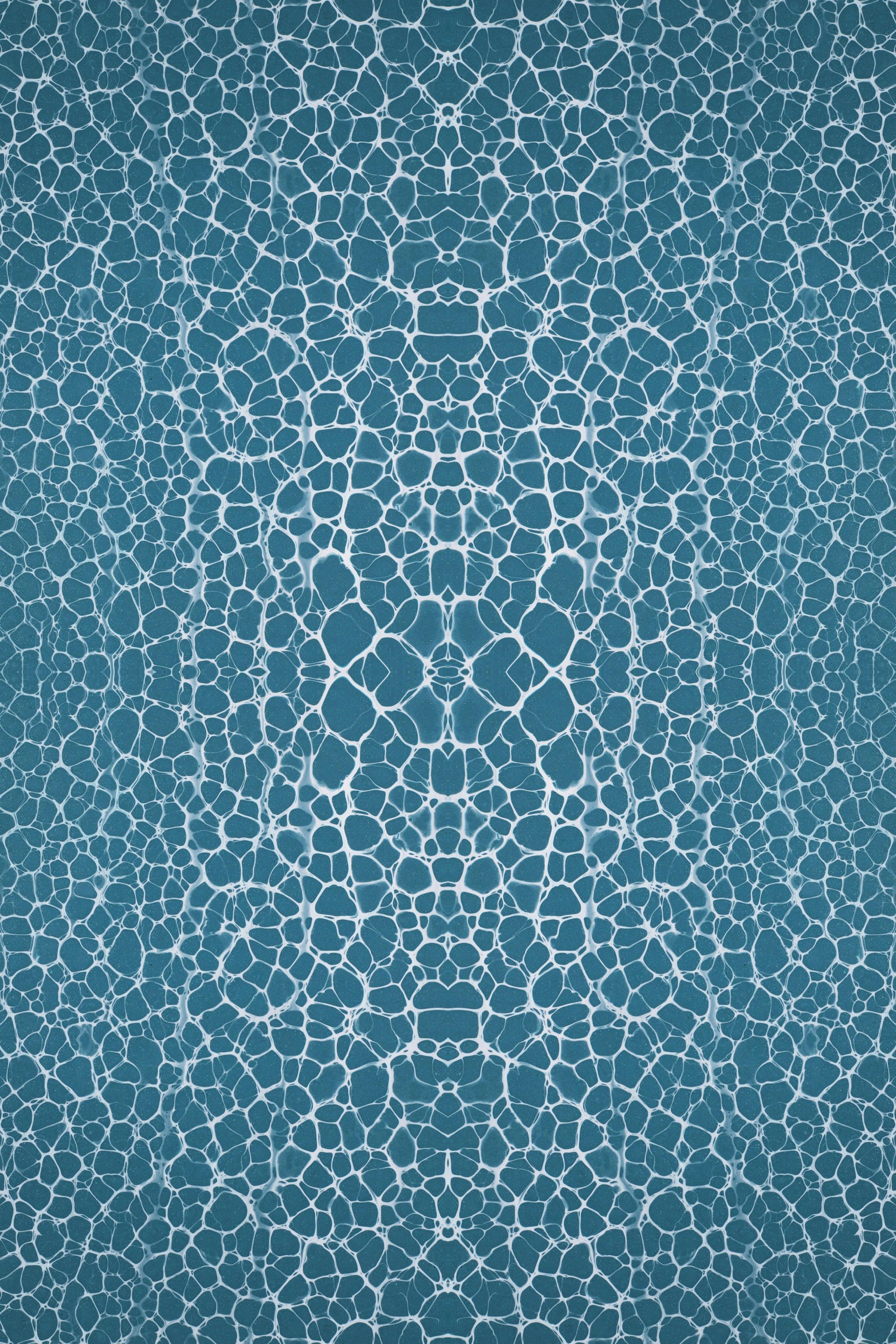 a blue background with a pattern of rocks