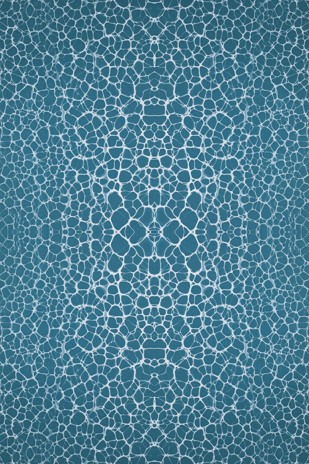 a blue background with a pattern of rocks