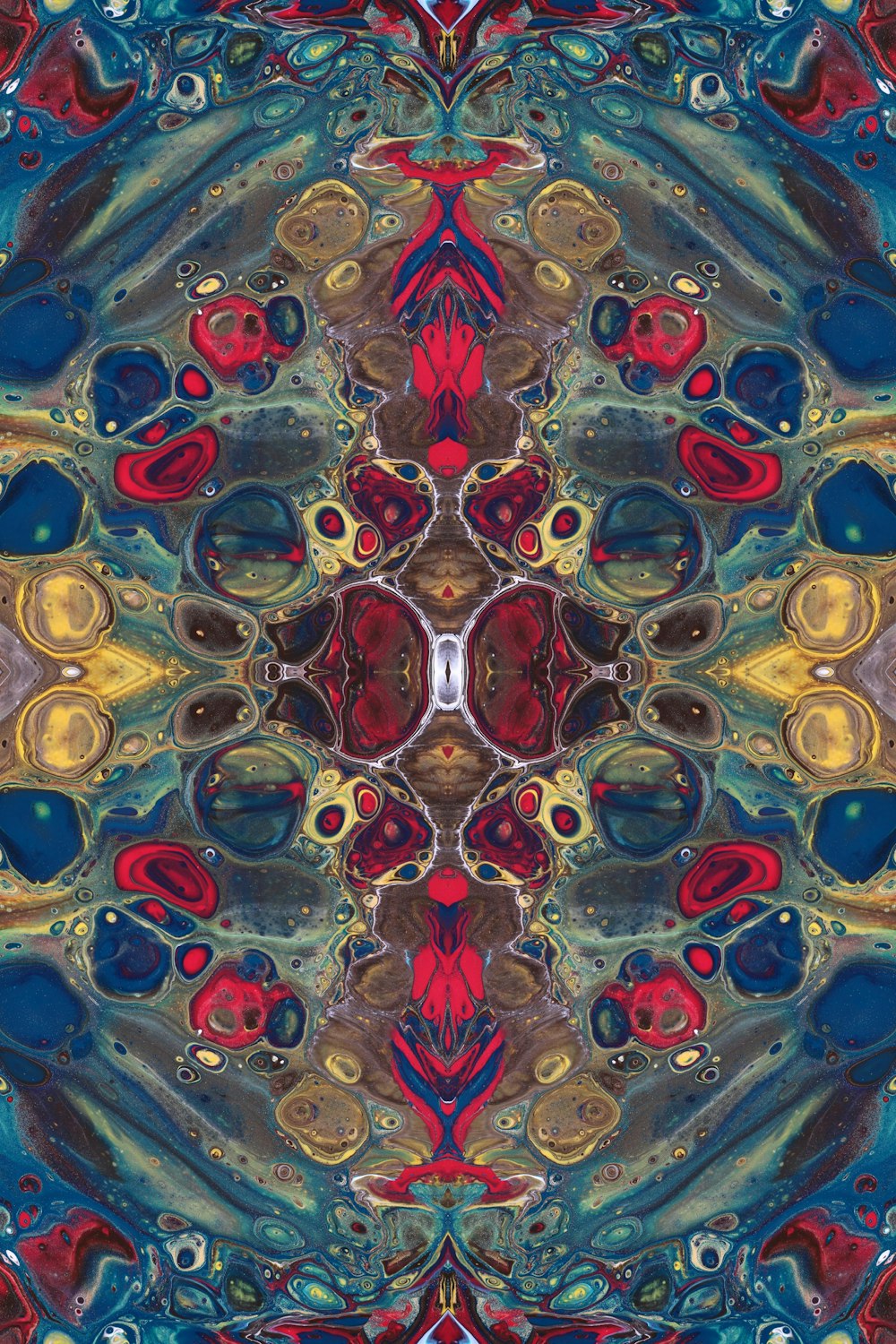 a colorful kaleite design with a red, yellow, and blue background