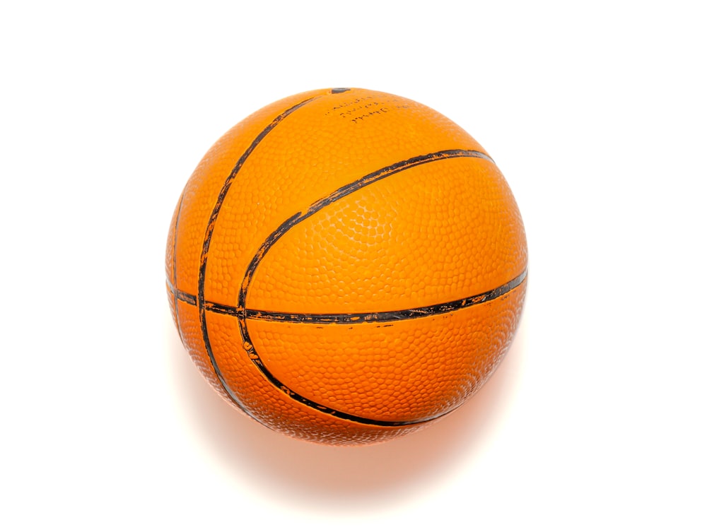 a close up of a basketball on a white background