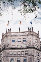 a building with flags on top