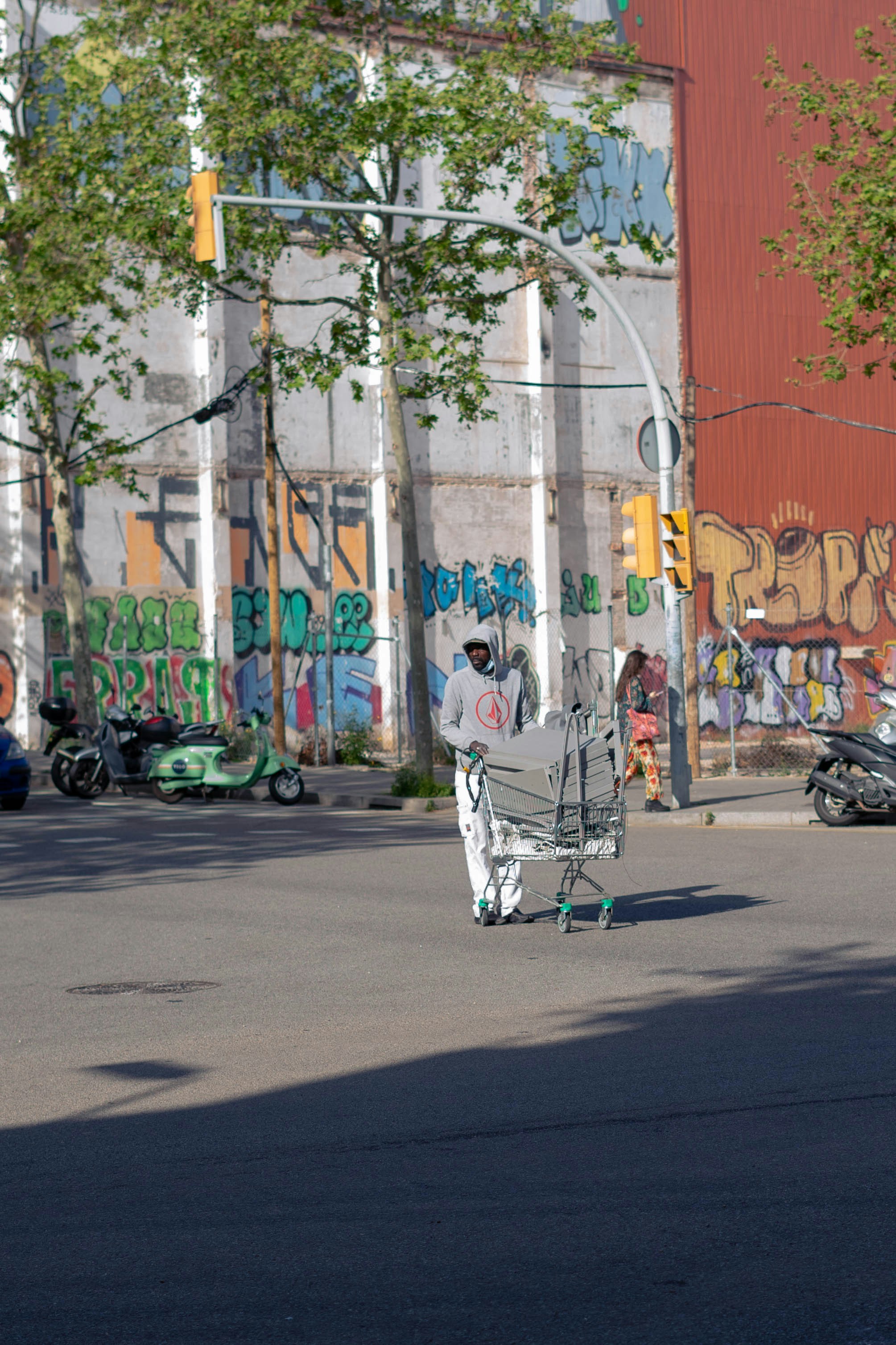 a person pushing a cart