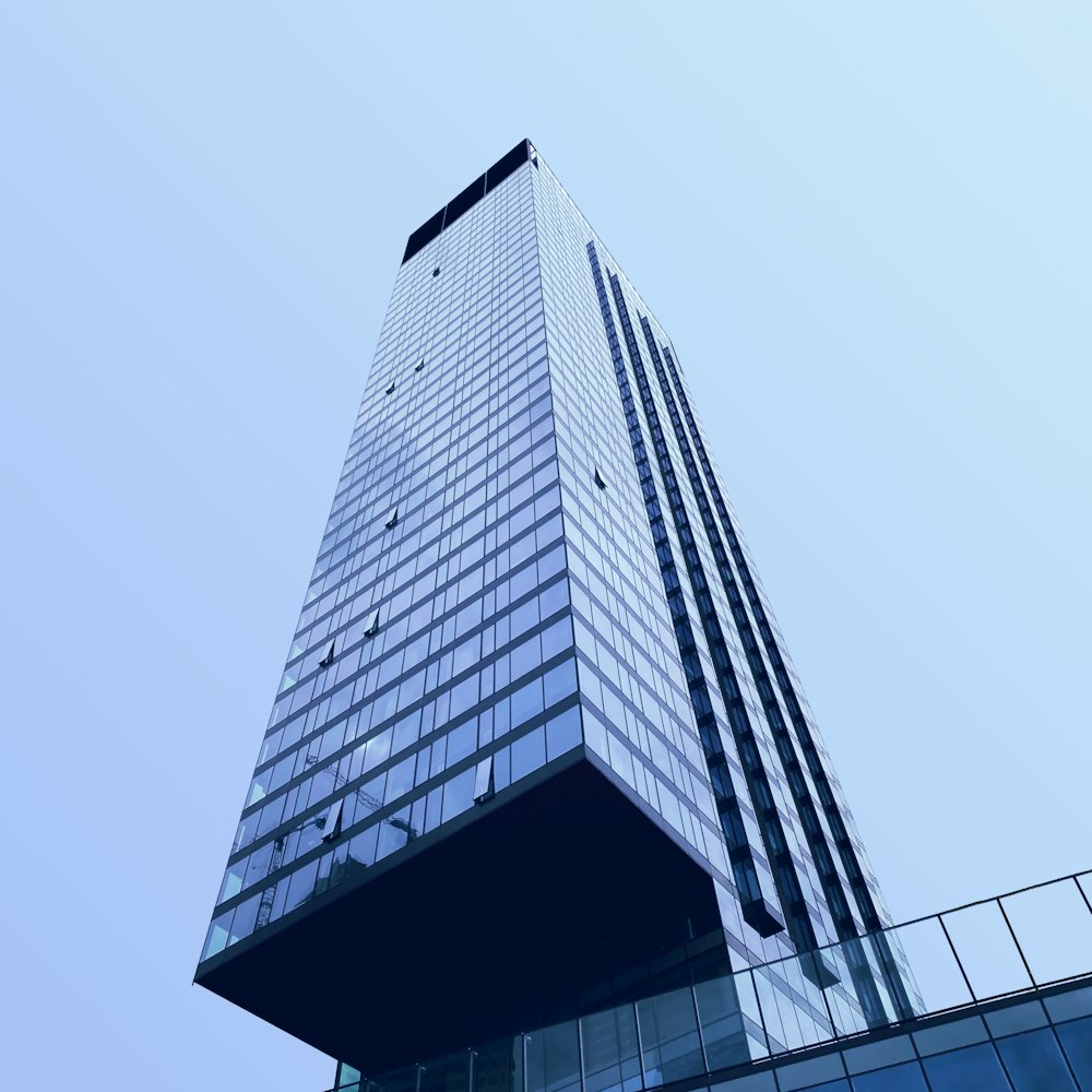a tall building with glass windows