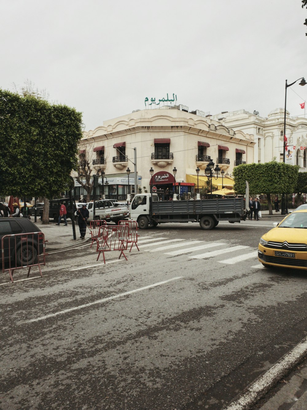 a truck is parked in front of a building