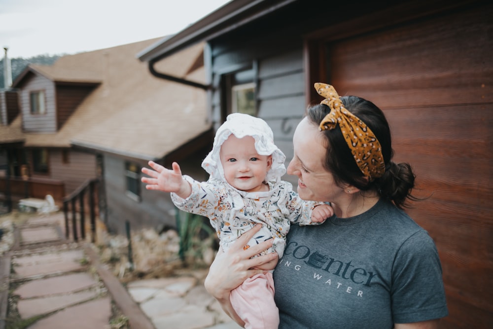 a person holding a baby