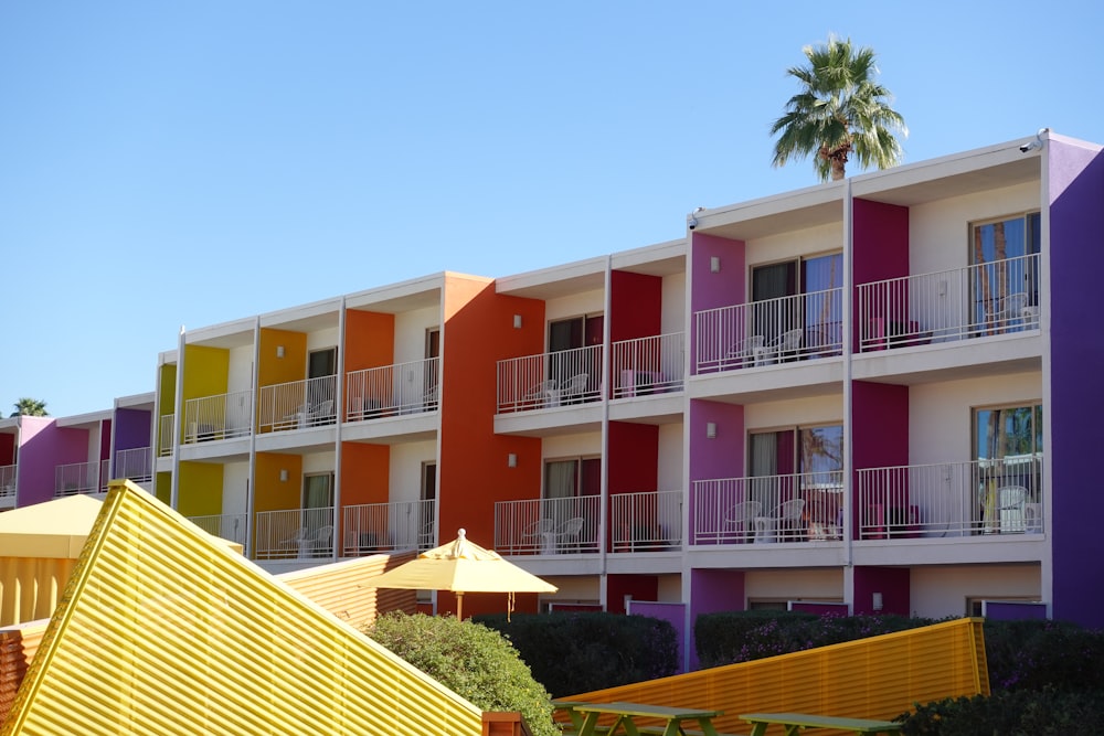 a building with a deck and trees