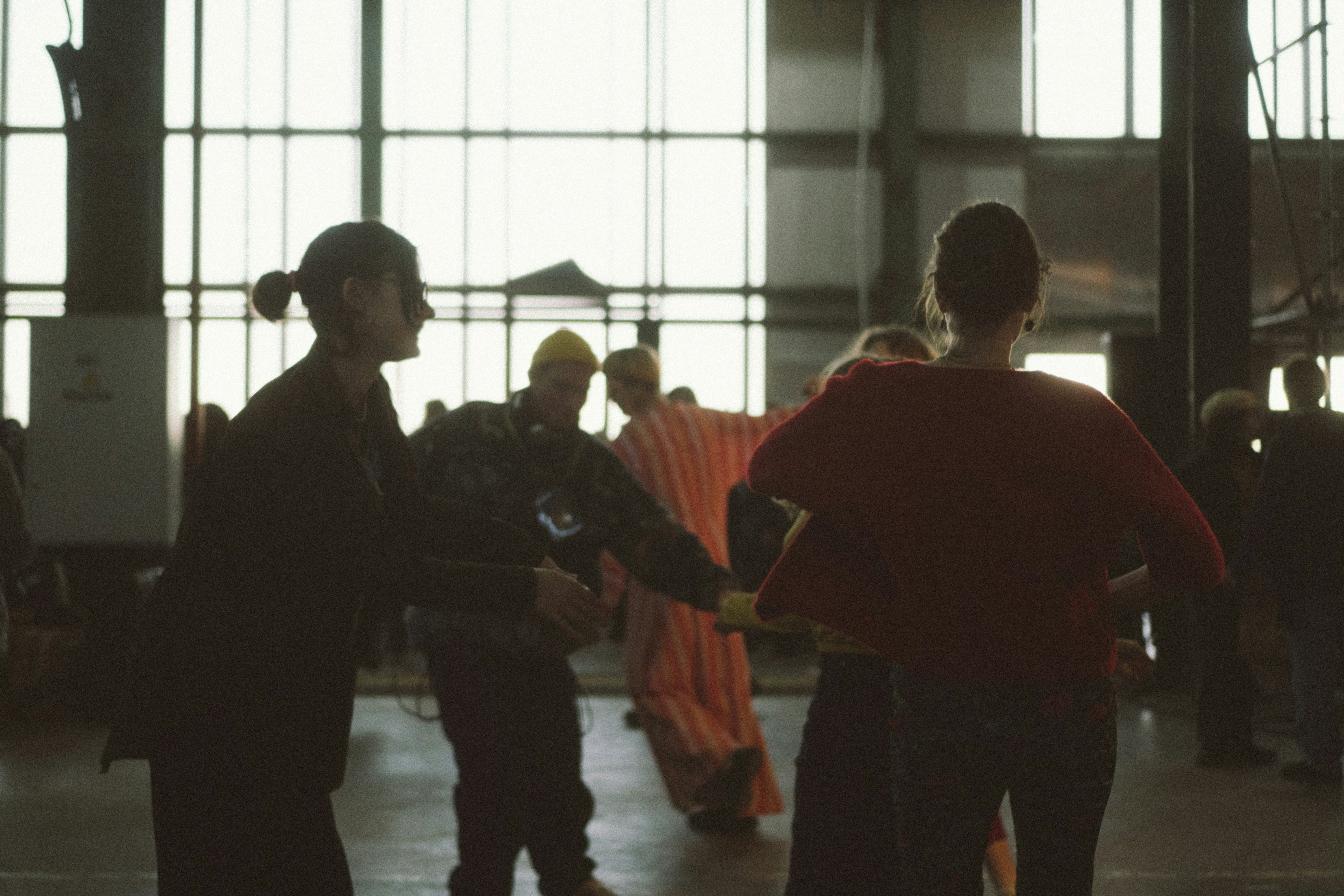 Handshake across jail counter - 24 hour bail bonds company