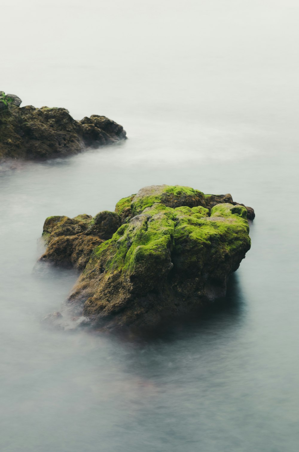 a rock formation in the water