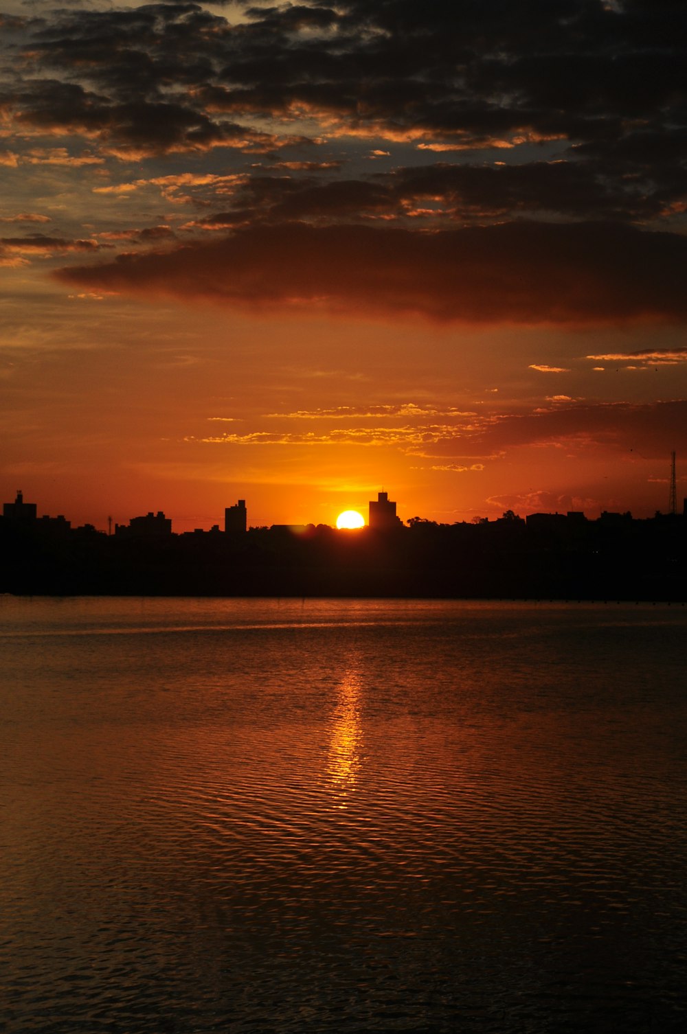 a sunset over a city