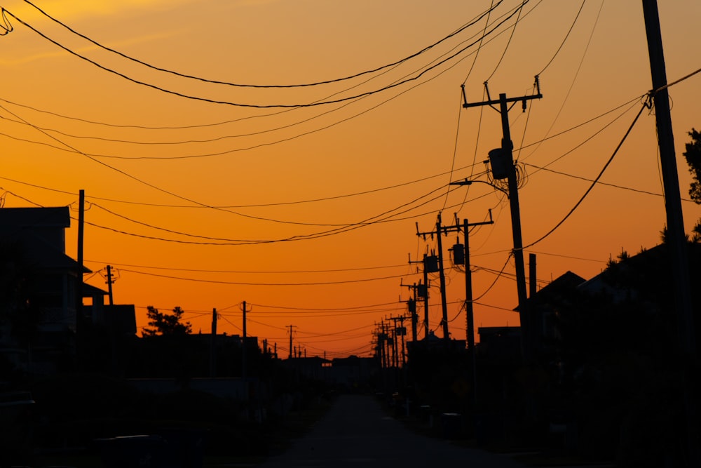 a sunset over a street