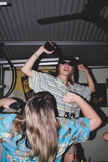 a man holding a microphone and a woman holding a microphone