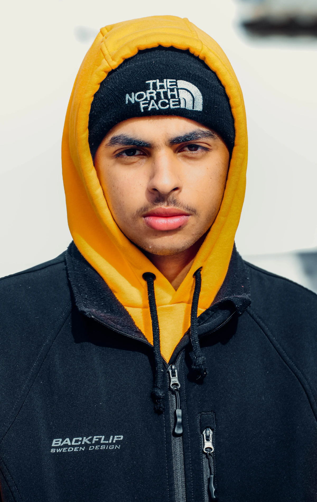 Person wearing a black hoodie