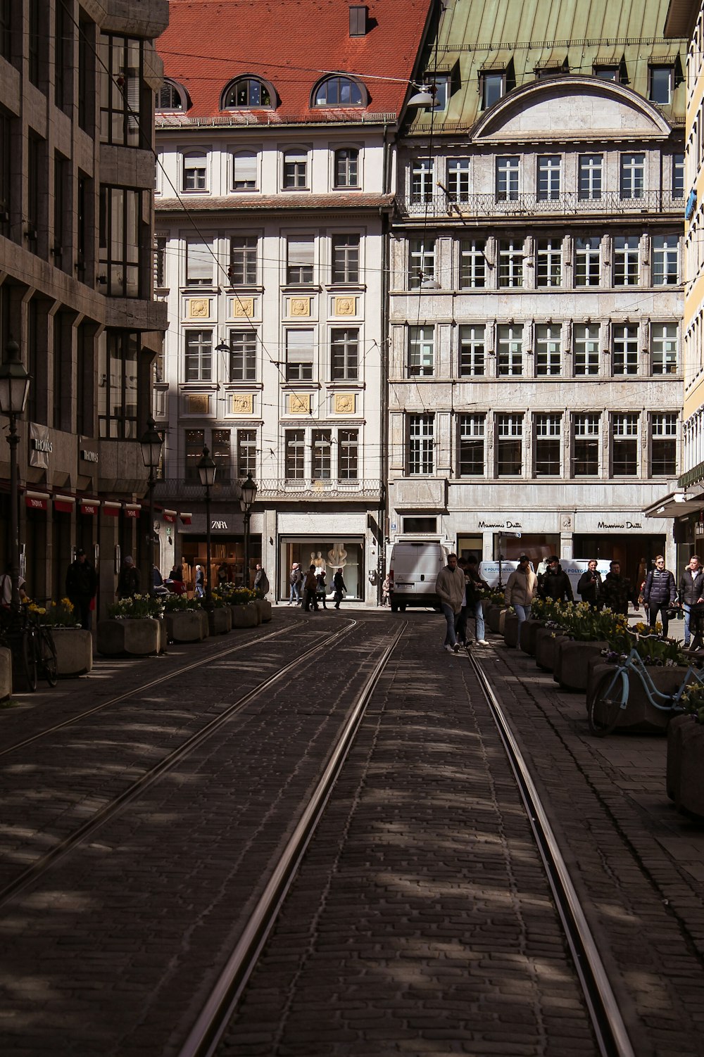 a train track between buildings