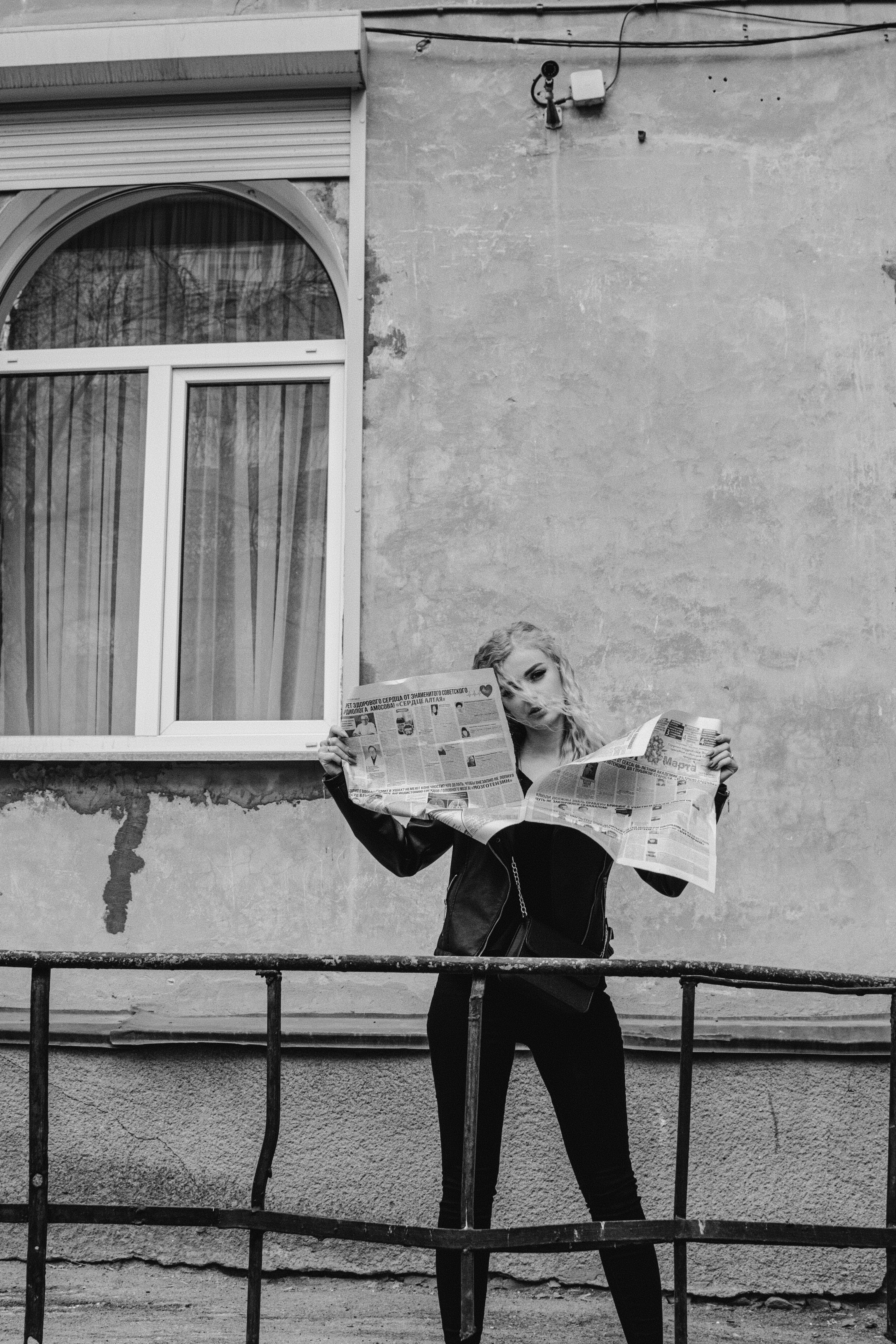 a person reading a newspaper