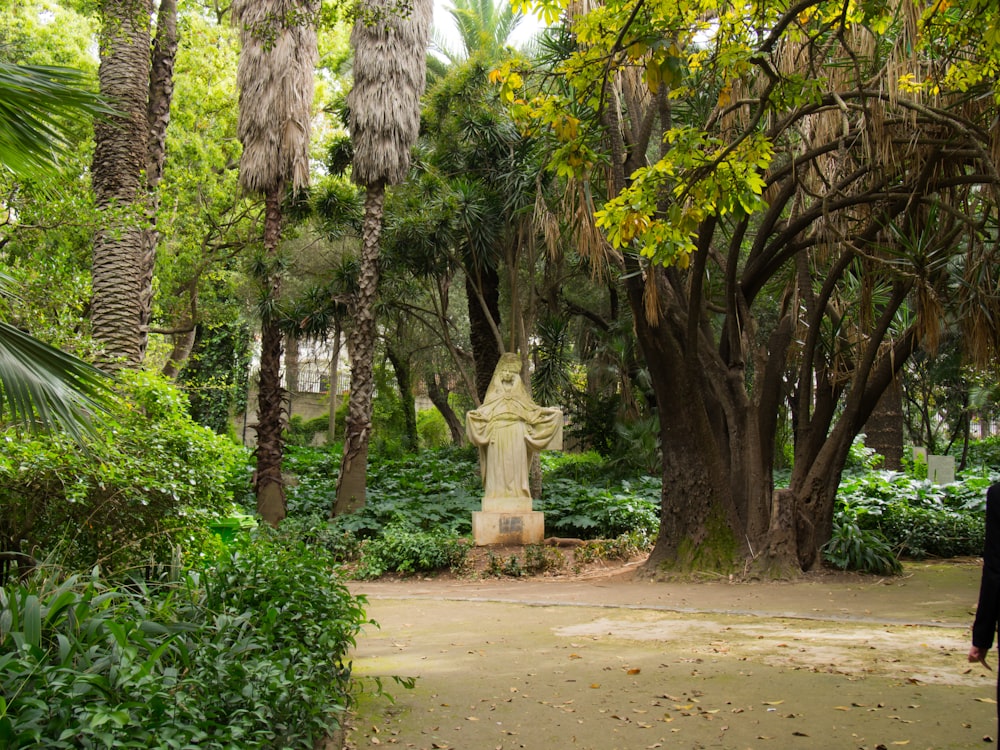 a statue in a garden