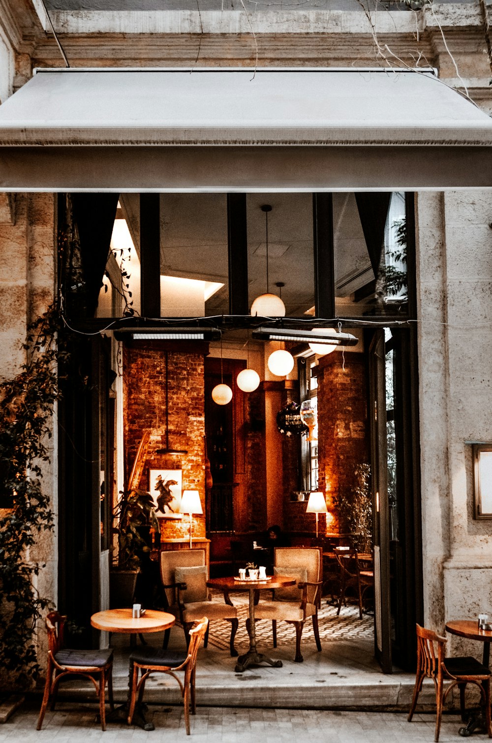 a restaurant with tables and chairs