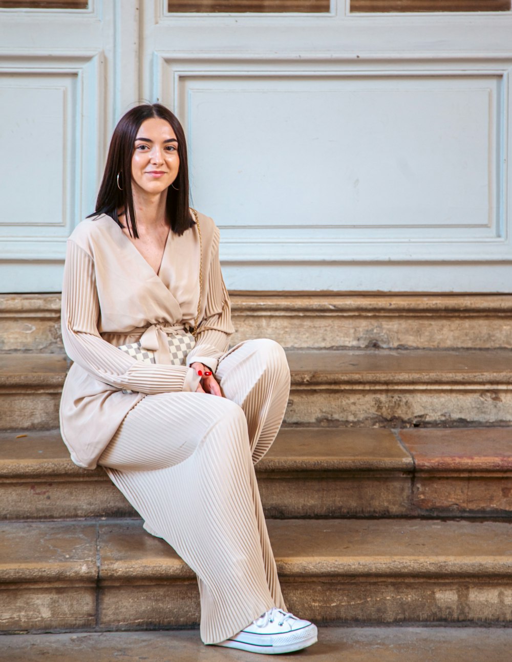 a person sitting on stairs