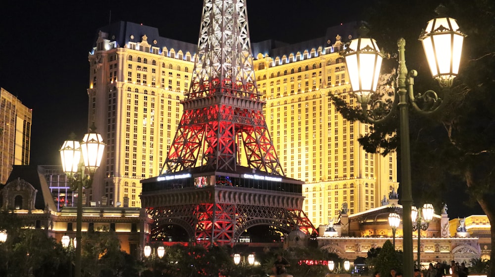 a tall tower with lights at night