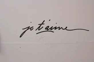 a whiteboard with black writing