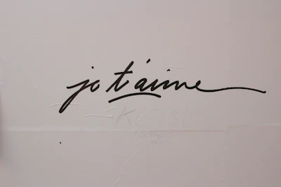a whiteboard with black writing