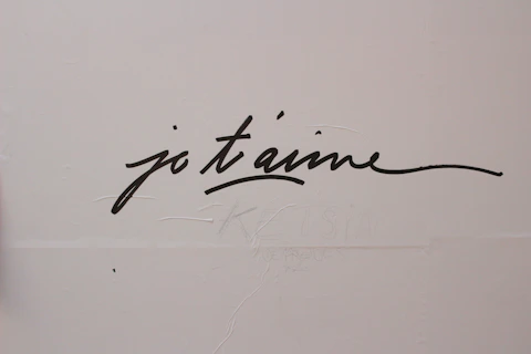a whiteboard with black writing