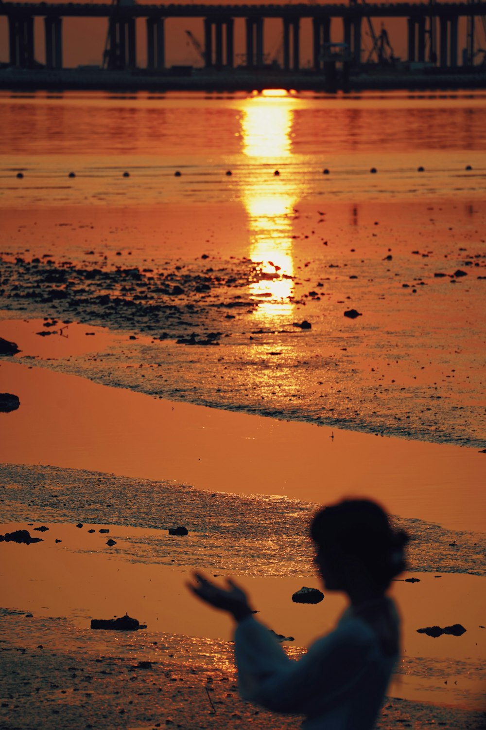 a person sitting on the beach