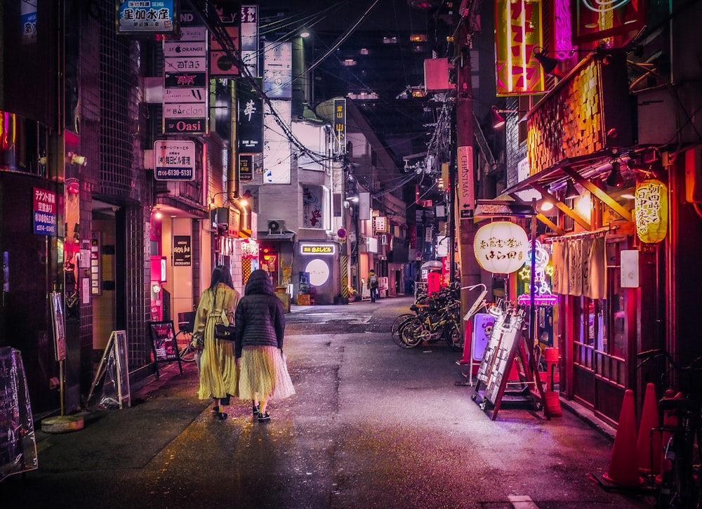 people walking down a street