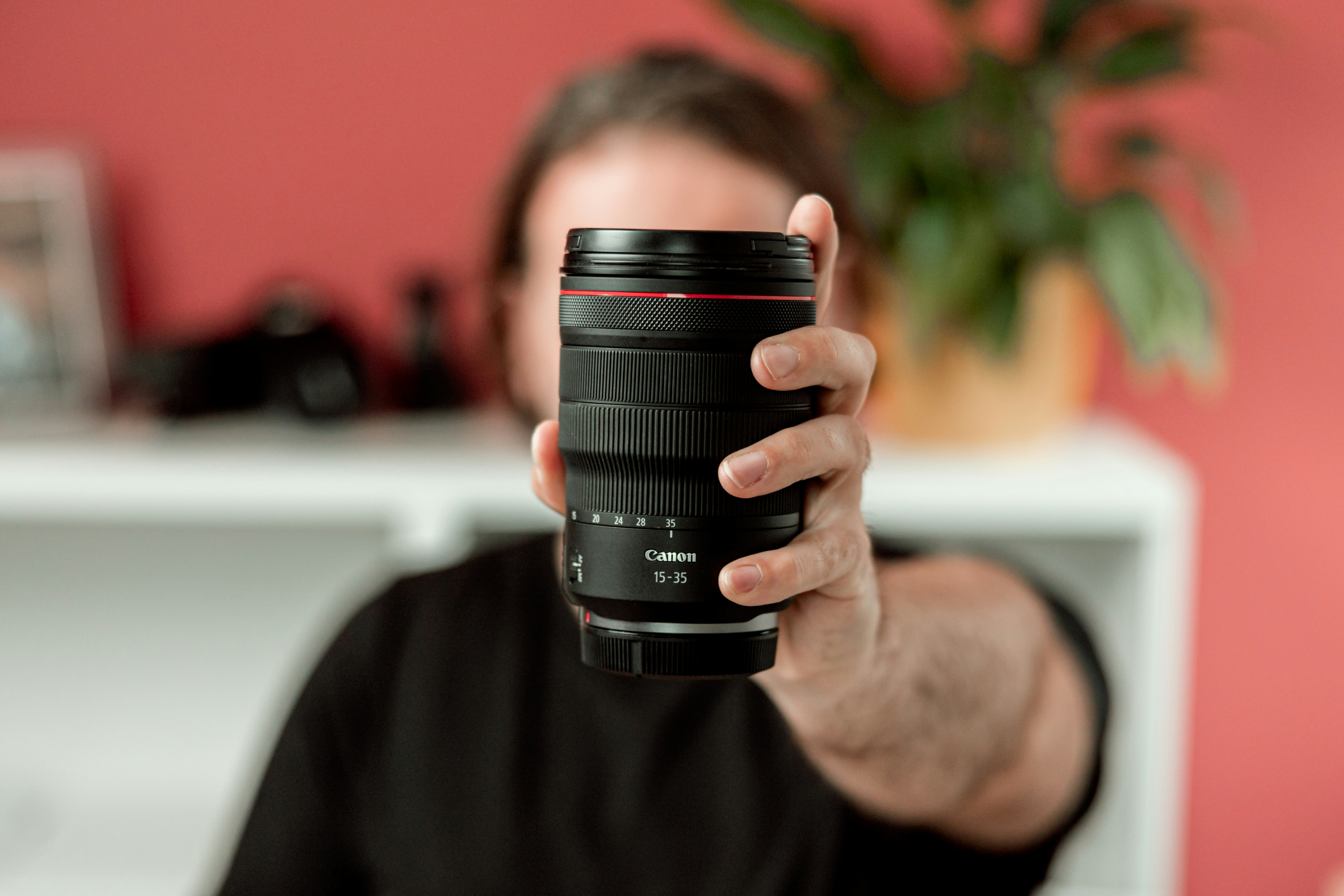 a person holding a camera