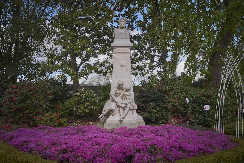 a statue in a garden