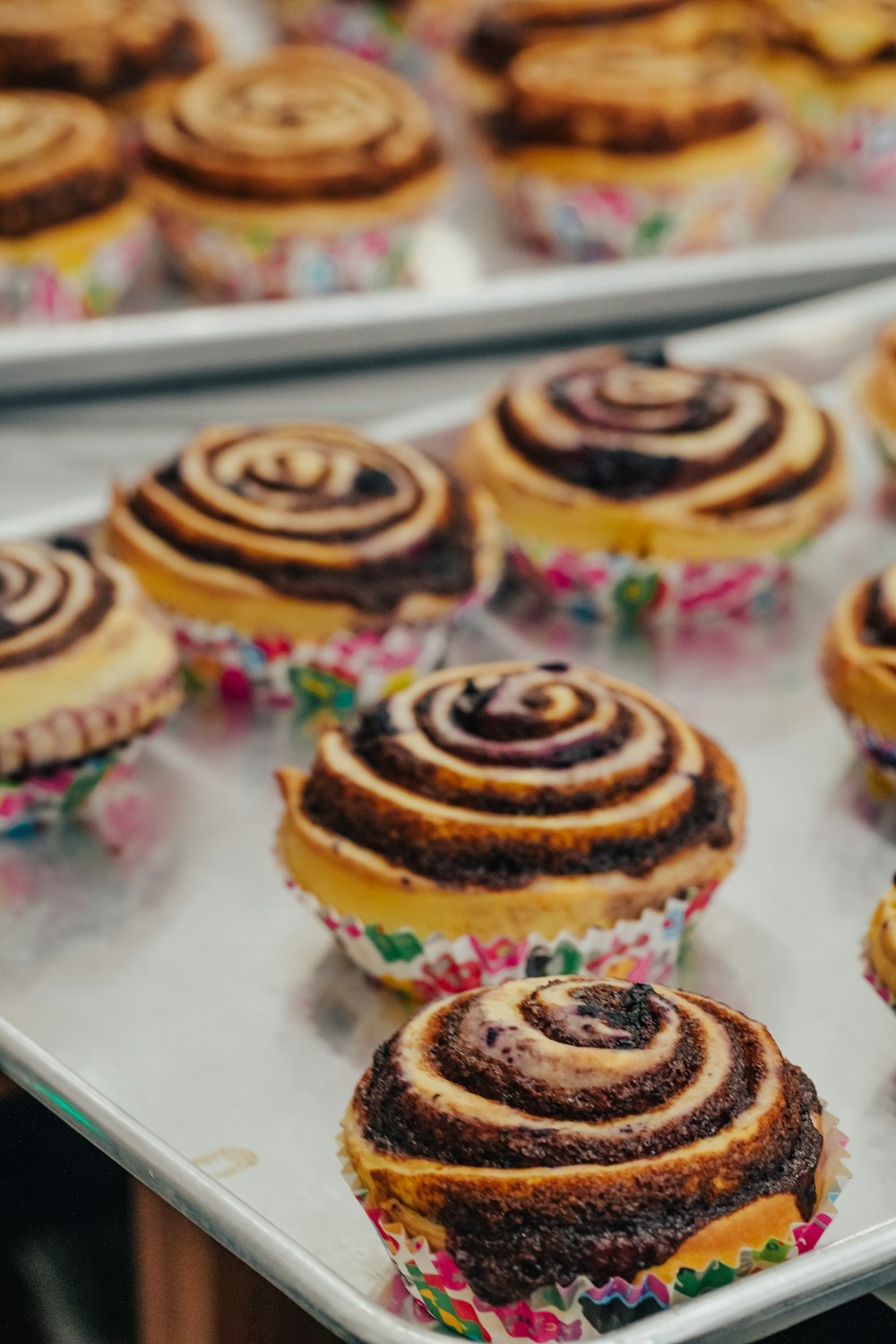 a group of pastries on a shelf