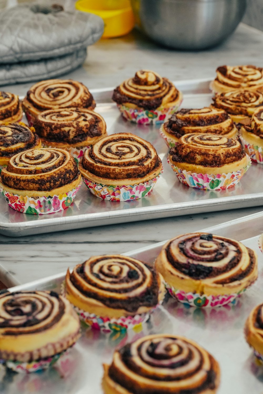 a group of cupcakes on a shelf