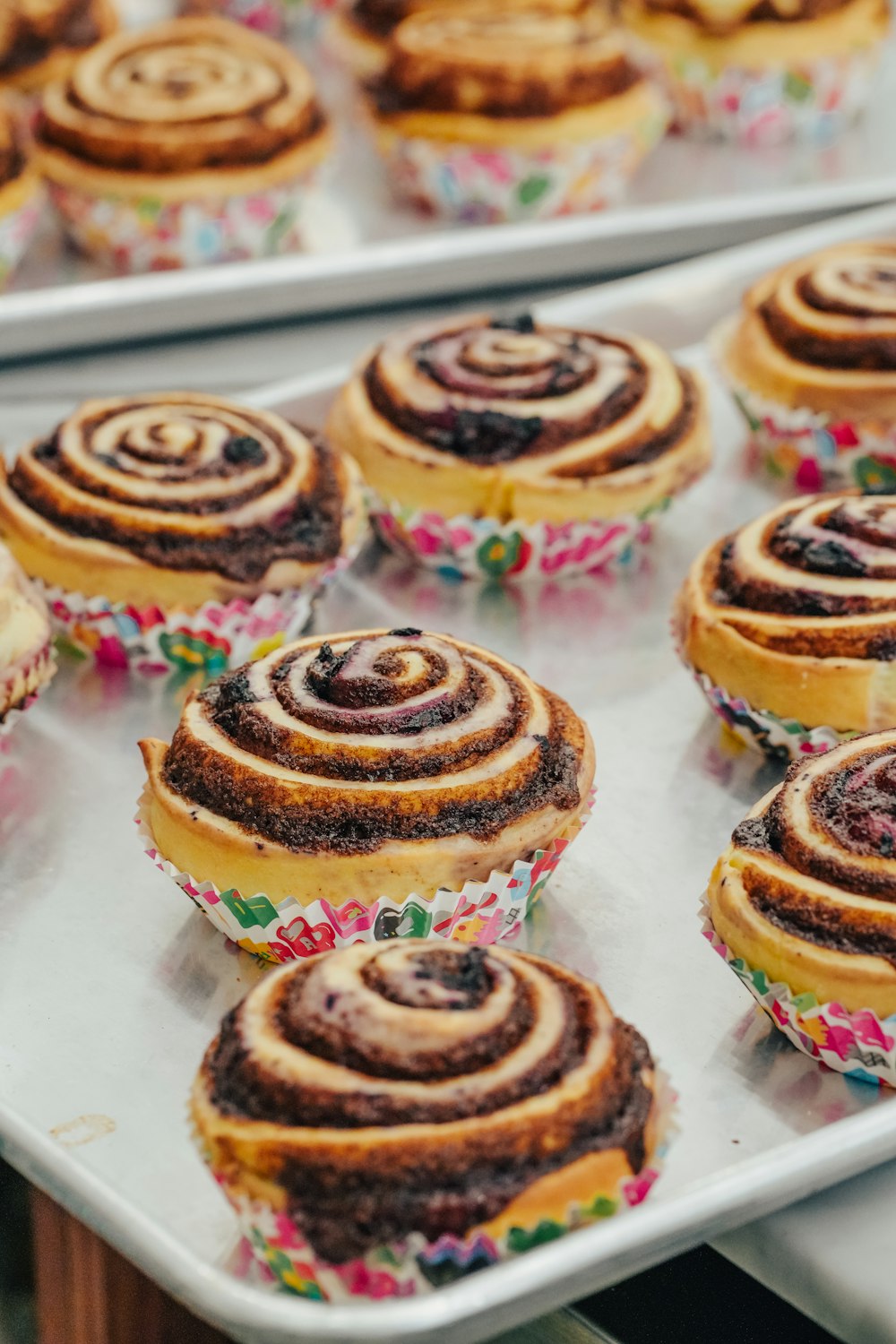 a group of pastries on a shelf