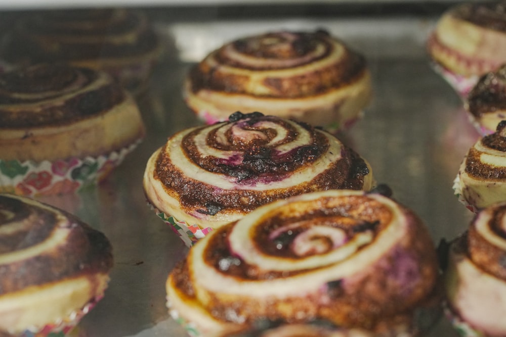 a group of pastries with frosting on them