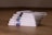 A close-up of soft facial tissues stacked neatly on a table.