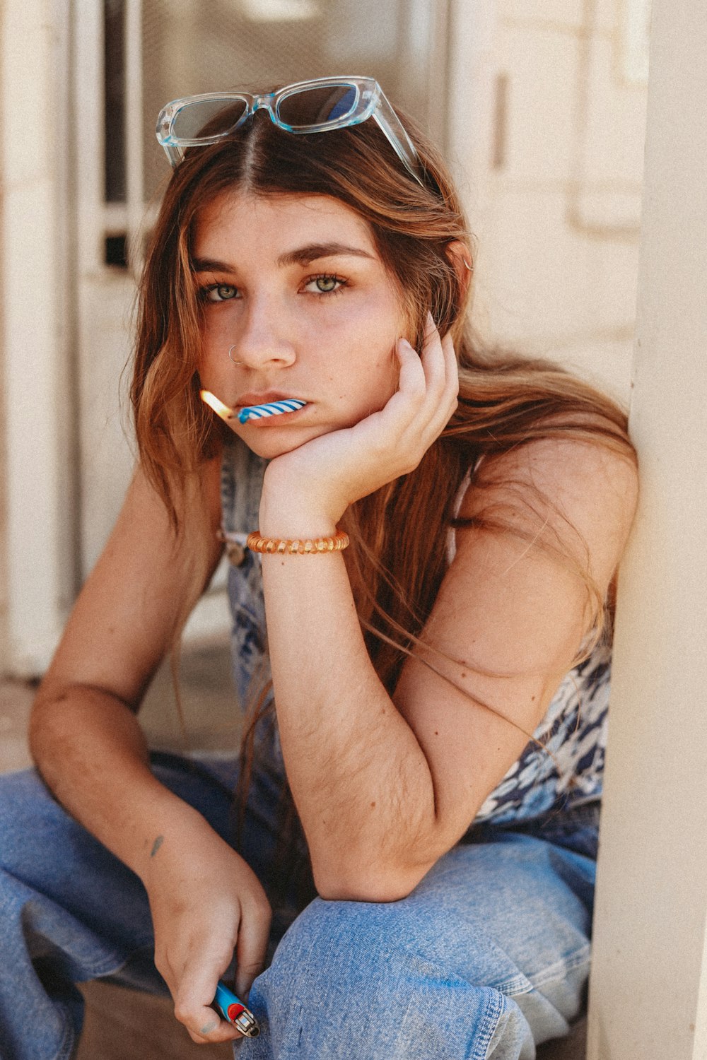 a woman with a toothbrush in her mouth