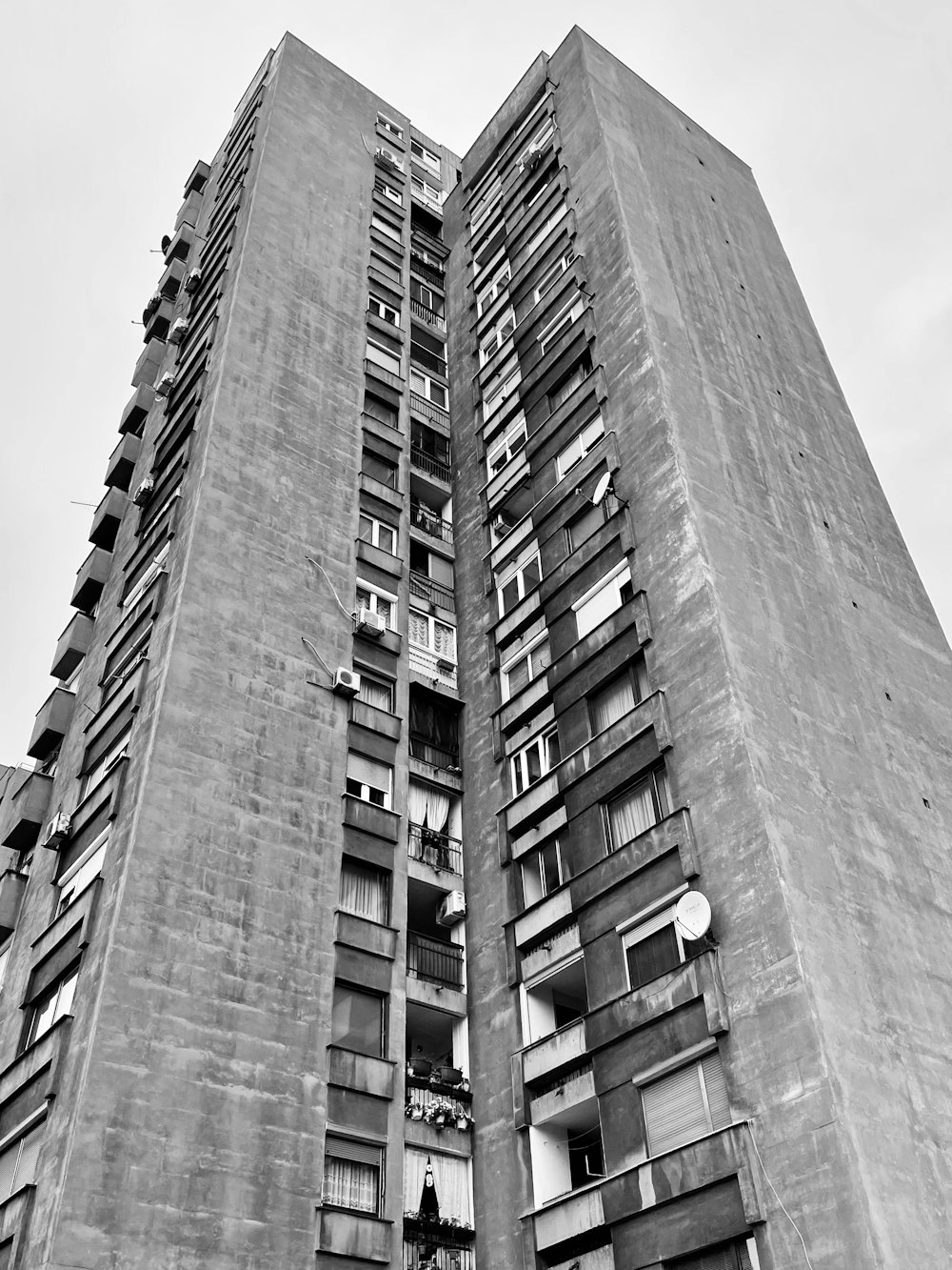 a tall building with balconies