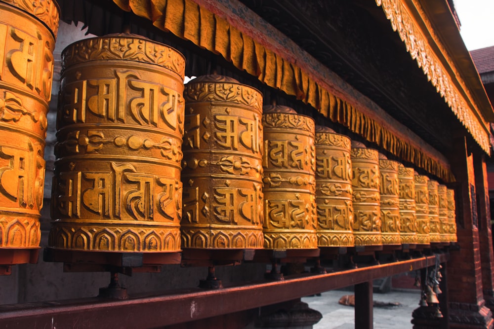 a wooden gate with carvings