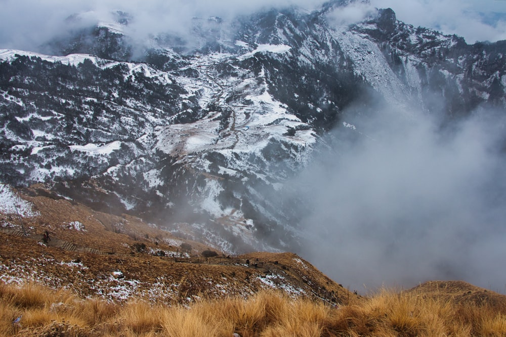 a mountain with clouds