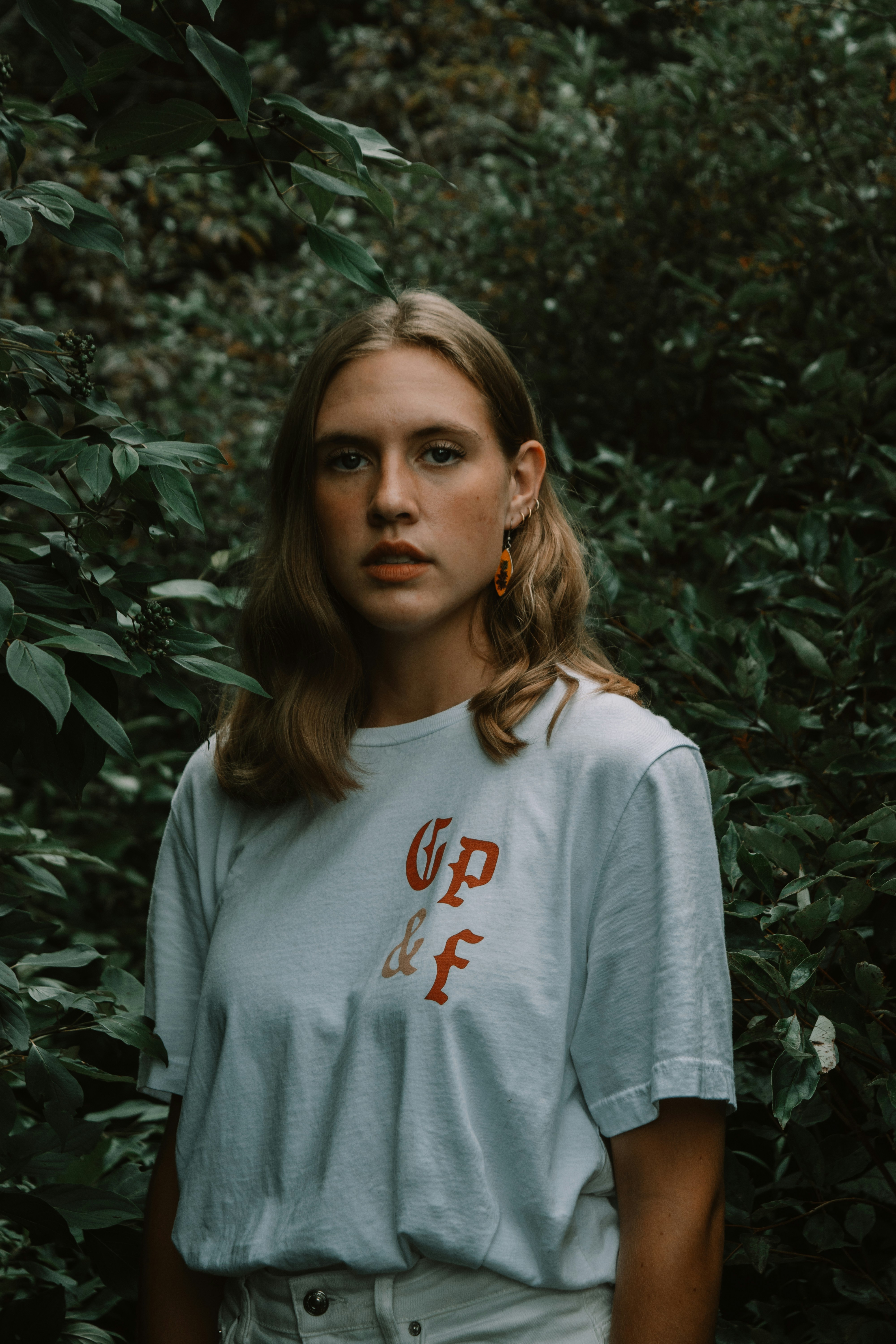 A collection of trendy accessories including watches, necklaces, and bags