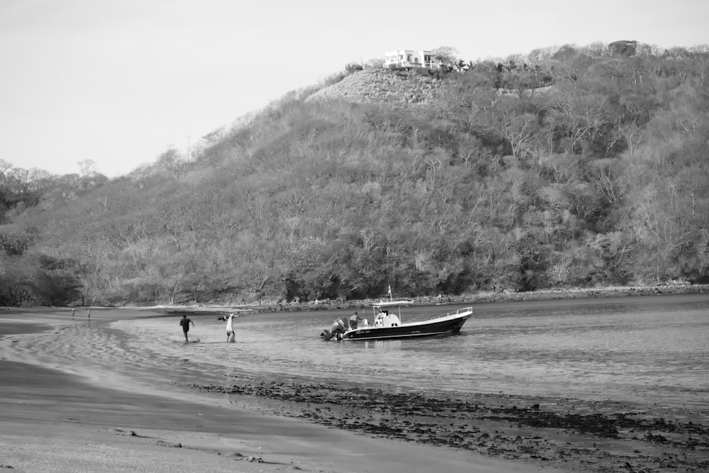 a boat is parked on the shore