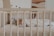 a person sleeping in a crib