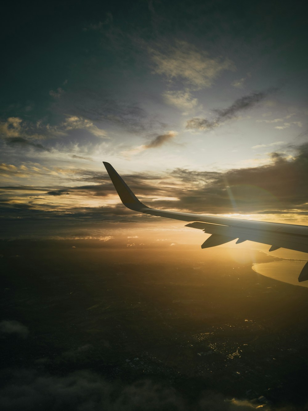 a plane wing in the sky