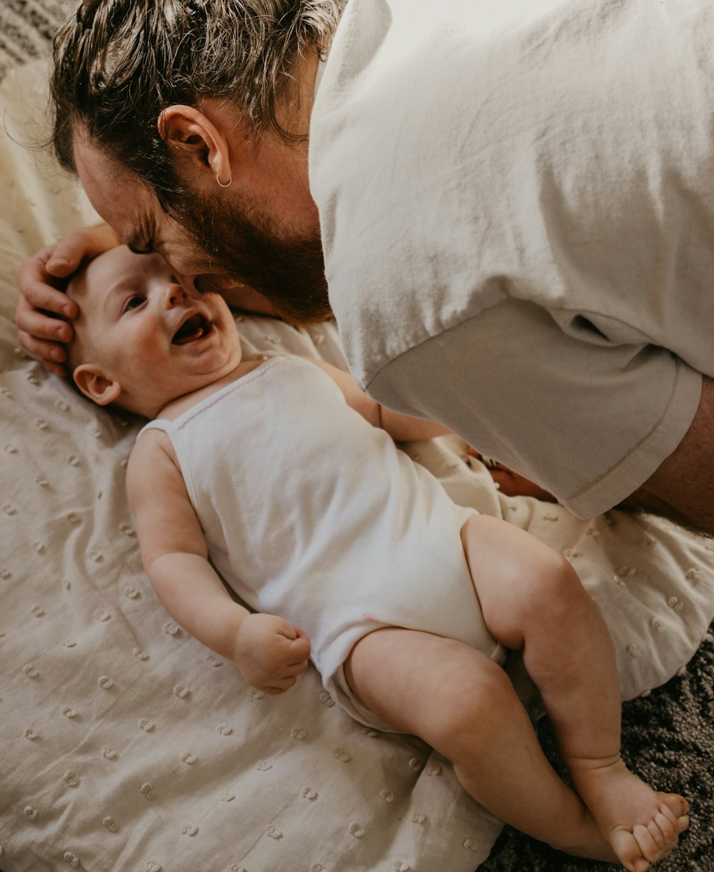 a man holding a baby