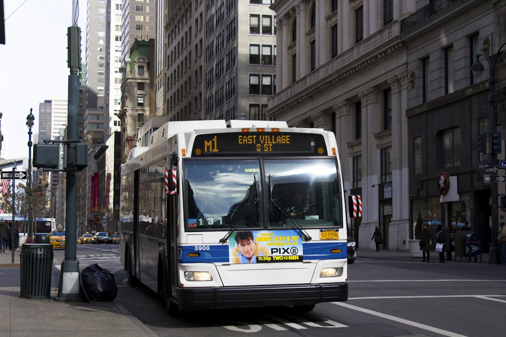 a bus travels down the street