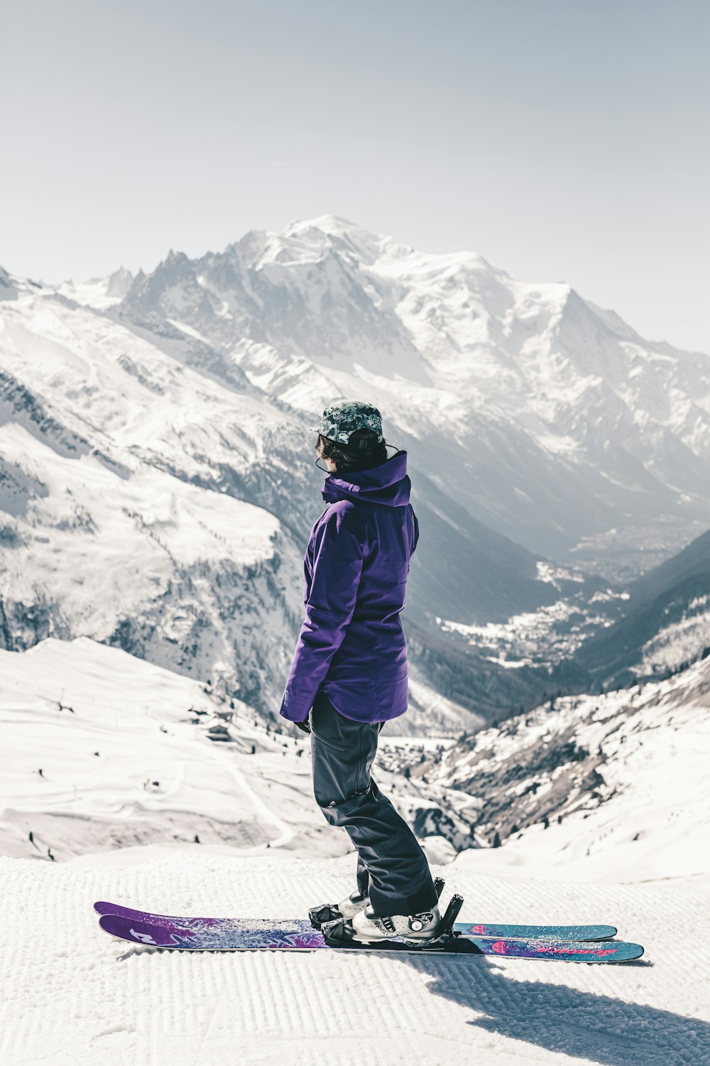 a person on a snowboard on a snowy mountain