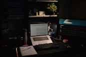 Calm workspace with minimalistic design, showing a laptop and notes about customer support automation.