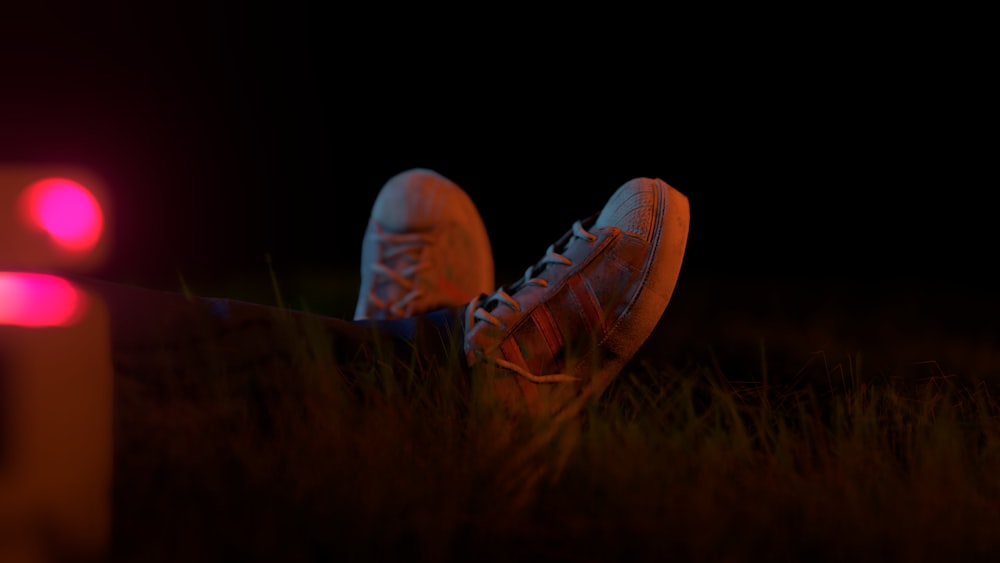 a person's foot in the grass